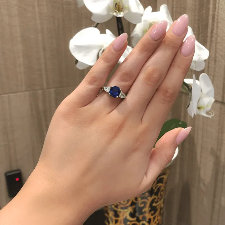 Side Stone Sapphire Engagement Ring
